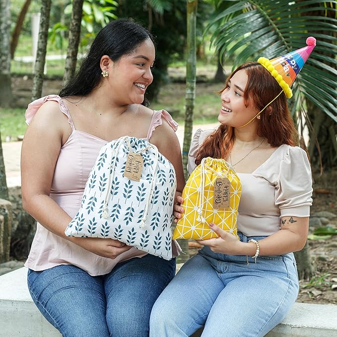 12 pcs Reusable gift bags. Bonus: 15 Gift tags & String. Multipurpose Gift wrap bags. Fabric gift bags. Gift bags assorted sizes for Holiday gifts, birthdays, parties. 1st Ed.